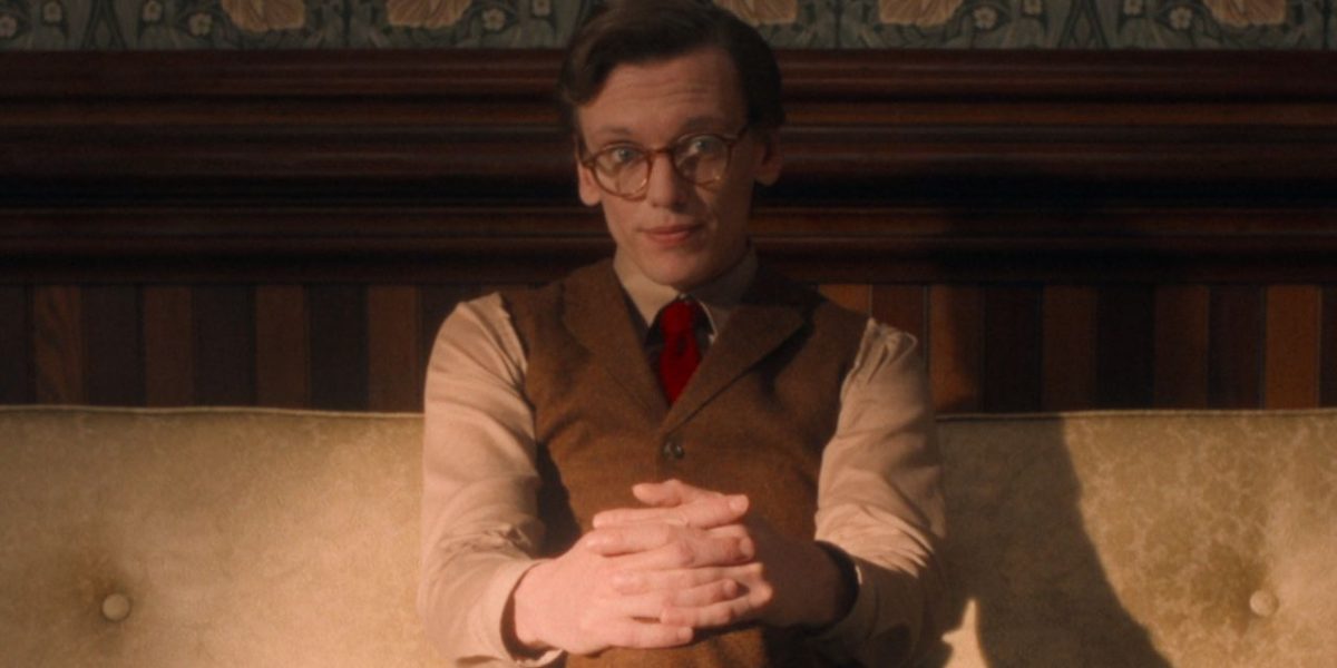 Mr. Whatsit sitting on couch in midscape in Stranger Things Season 5