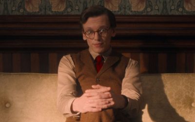 Mr. Whatsit sitting on couch in midscape in Stranger Things Season 5