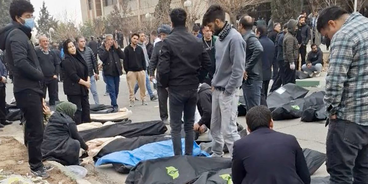 Videos of body bags and machine guns give rare glimpse of Iran's bloody crackdown