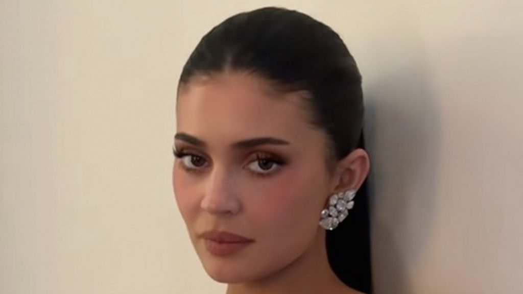 Kylie Jenner looks flawless in skintight silver gown at Golden Globes as fans rave her look is a ‘10 out of 10’