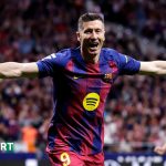 Robert Lewandowski celebrates scoring Barcelona's winner against Atletico Madrid