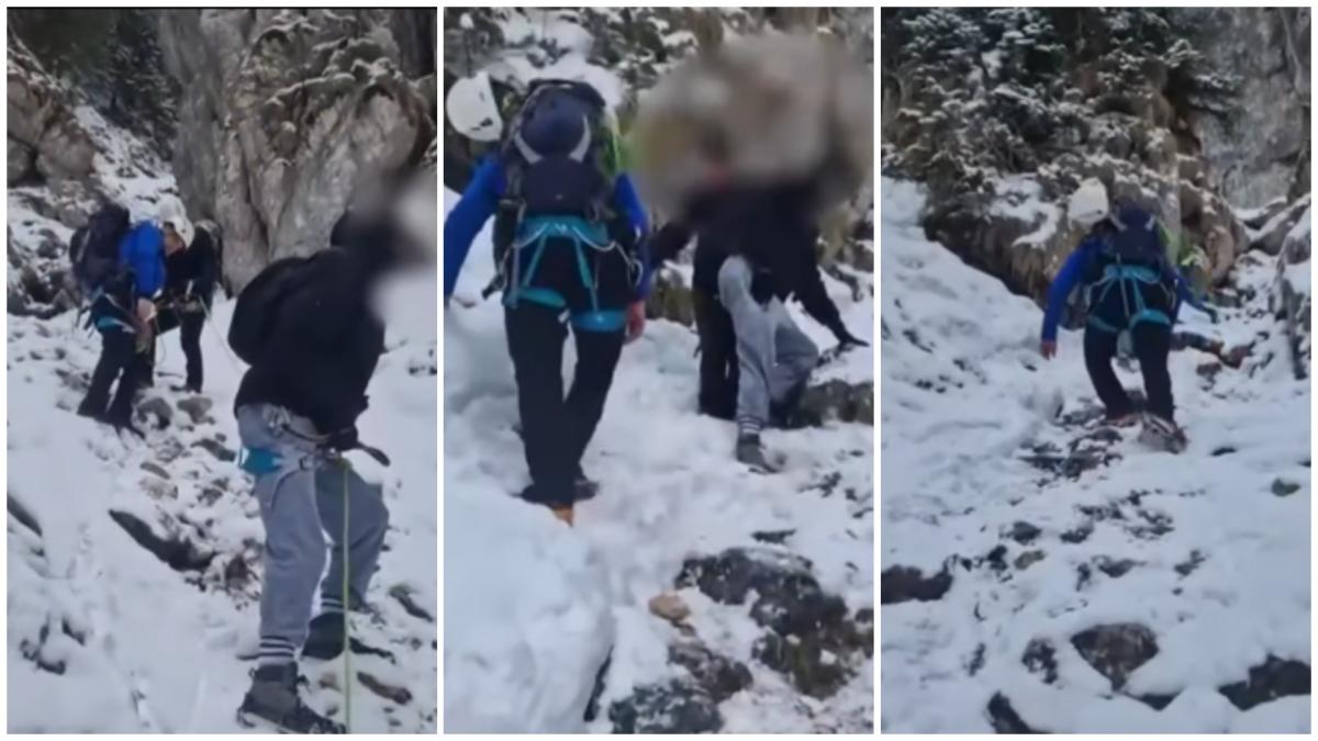 Doi turiști, salvați de pe munte, au stat culcați pe burtă o oră și jumătate