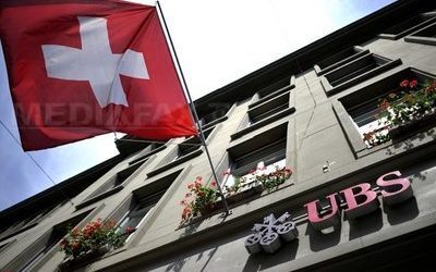 Elveția frânează bonusurile bancherilor de top