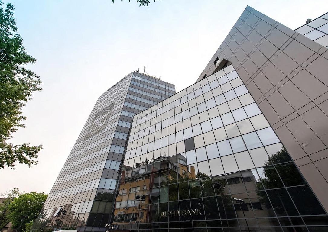 Global Vision cumpără fosta clădire Alpha Bank din București